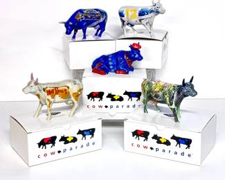 Lot 89 | (5) Cow Parade Figurines Including "Moonet", "Hot Dog", "Even Cowgirls Get the Blues", "iMoo" and "Broadway"