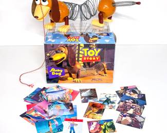 Lot 90 | Disney's Toy Story Slinky Dog with Box and Trading Cards 