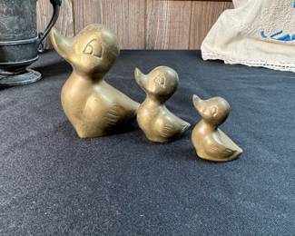 Brass ducklings, some scratches, tallest is 3"