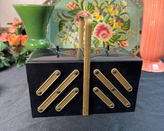 Plastic black and gold expandable makeup/jewelry case 7"H x 8"W