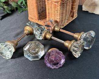 Basket of glass door knobs with some hardware, 2 have some damage