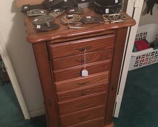 Jewelry cabinet, belt buckles 