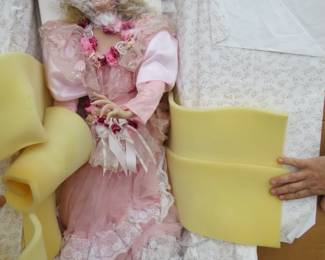 Lot 411. Three dolls including a 43" doll from the "Welden Museum of Fine Collectibles"