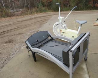 Lot 434. Air Gometer exercise bike and a Pro-Form 755CS treadmill (powers on)