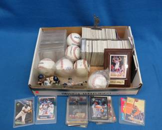 Lot 391. Baseball, Football, Basketball Cards, Baseballs, and Figures