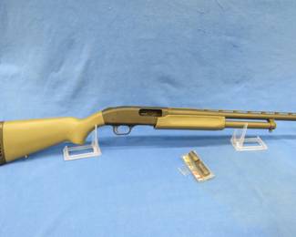 Lot 4. Mossberg Model 500A 12-gauge pump-action shotgun with synthetic stock and three chokes.&nbsp; S/N: P4310565