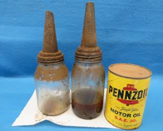 Lot 152. Two vintage oil spouts and an unopened cardboard can of Pennzoil