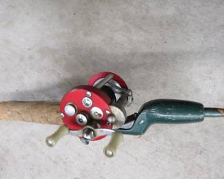 Lot 447. 5' steel rod with a Pflueger Deluxe Nobby No. 1960 bait-casting reel.