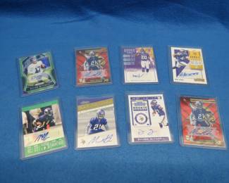 Lot 284. Topps, Panini Rookie Ticket, Contender, Comeback Signature Vikings Football Cards and More