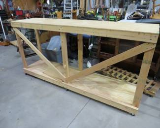 Lot 480. 96x47x24 homemade workbench on wheels