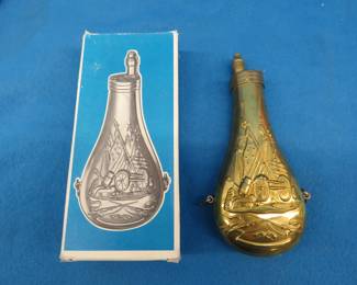 Lot 161. Brass powder flask made in Italy