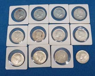 Lot 314. Twelve 1964 Kennedy half dollars.