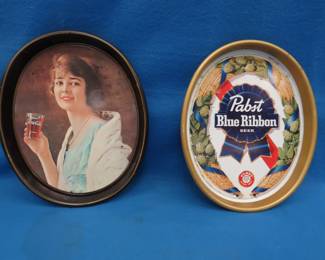 Lot 276. Two metal beer trays