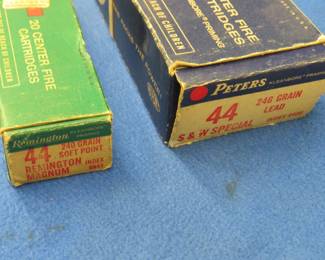 Lot 140. Vintage Peters 44 S&W Special box with some empty casings and a vintage Remington 44 Remington Magnum box with some empty casings