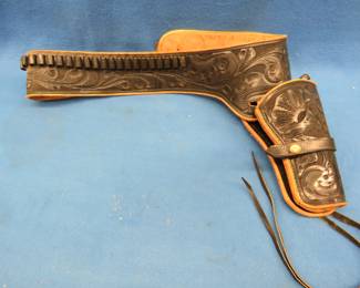 Lot 84. Leather holster with cartridge holders.&nbsp; Approx. for a 34" waist.