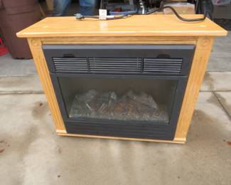 Lot 491. Heat Surge Electric fireplace heater
