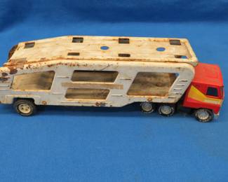 Lot 343. Buddy L "Mack" truck and a Tonka car hauler trailer