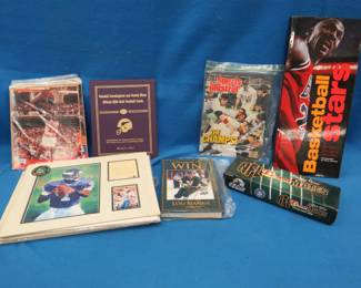 Lot 280. Sports collectibles including an autographed book by Lou Nanne