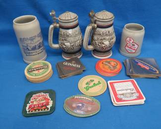Lot 167. Beer Steins, Mugs, and Coasters