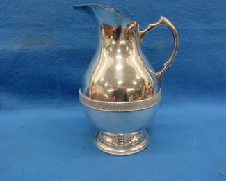 Lot 397. Silverplate pitcher made in Paris France.&nbsp; Small area of plate loss as shown.