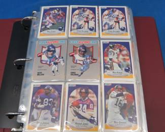 Lot 332. A binder of sports trading cards, many of which are from Minnesota teams