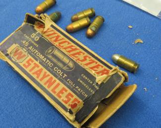 Lot 137. .45 Automatic Colt rounds in a vintage Winchester box