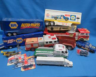 Lot 296. Nylint Napa Race Trailers, Hot Wheels New in Package, Toy Fire Trucks, and More