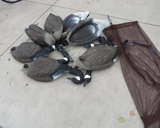 Lot 449. Goose decoys, 7 bodies, 6 heads, and a bag