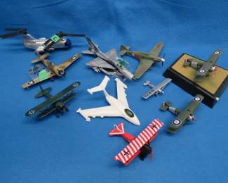 Lot 67. Nine Model Planes and a Helicopter