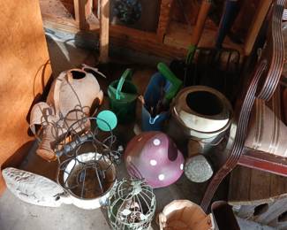 Nice selection of garden watering cans and pots planting