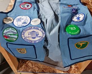 Ford Model A club vest with various assortment of Patches from different clubs