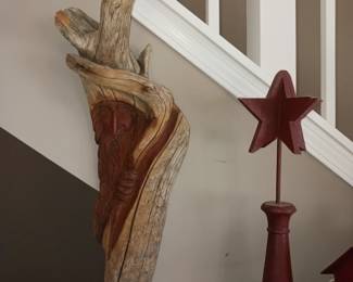 Hand carved driftwood while decoration