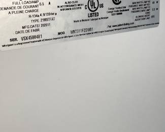 White Whirlpool Refrigerator/Freezer.