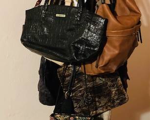 Assorted Women's Purses and Handbags.