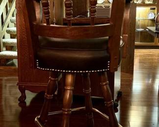 Leather & brass bar stools back. 7 - will not split. 
