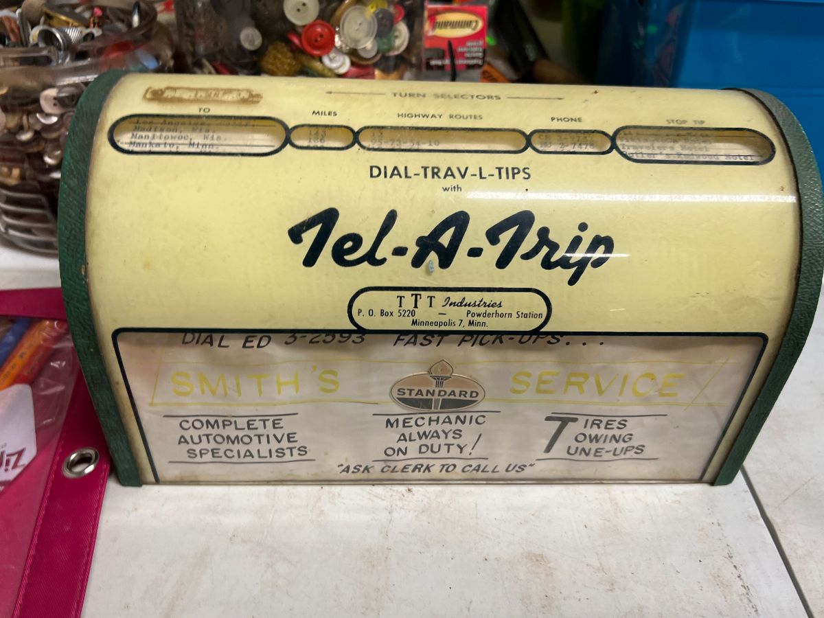 Tel-a-Trip Dial Gas and Oil advertising item.