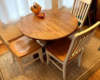Oak table with extensions and chairs