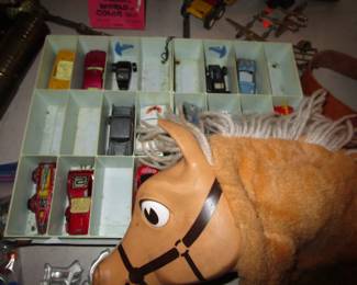 Mr Ed puppet and some toy cars