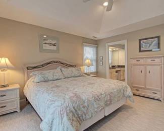 King bedroom suite: king bed, two nightstands, long dresser with mirror, armoire