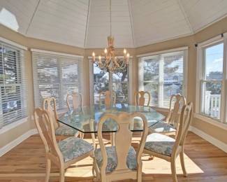 Hexagonal glass dining table seats 6