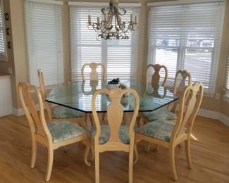 Hexagonal glass dining table seats 6