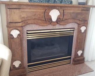 Seashell motif fireplace mantel