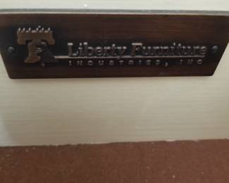 Stylish white bedroom suite by Liberty Furniture: bed, two nightstands, dresser