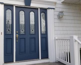 Front door with two side lights