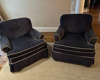 pair of slipcovered armchairs with down cushions