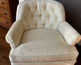 pair of tufted back armchairs