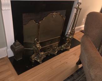 Brass fireplace screens and decorative fireplace accents.