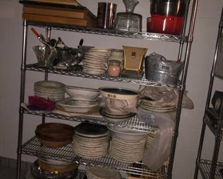 Tons of Williams Sonoma dishware, Le Crueset pots, wood bowls and decorative dishware and accessories.