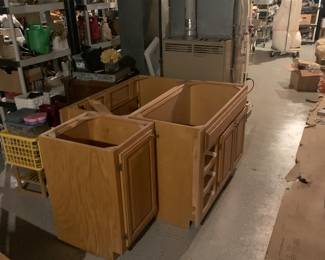 Wood bathroom vanities (take with or without sinks).  Use both or one piece, will sub-divide. 6 panel doors, wood fireplace mantel and various renovation saves.