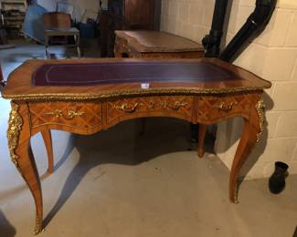 Louis 14 style writing desks with gold details.